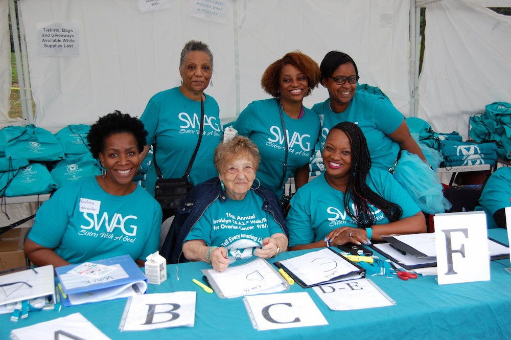 Josie and swag volunteers